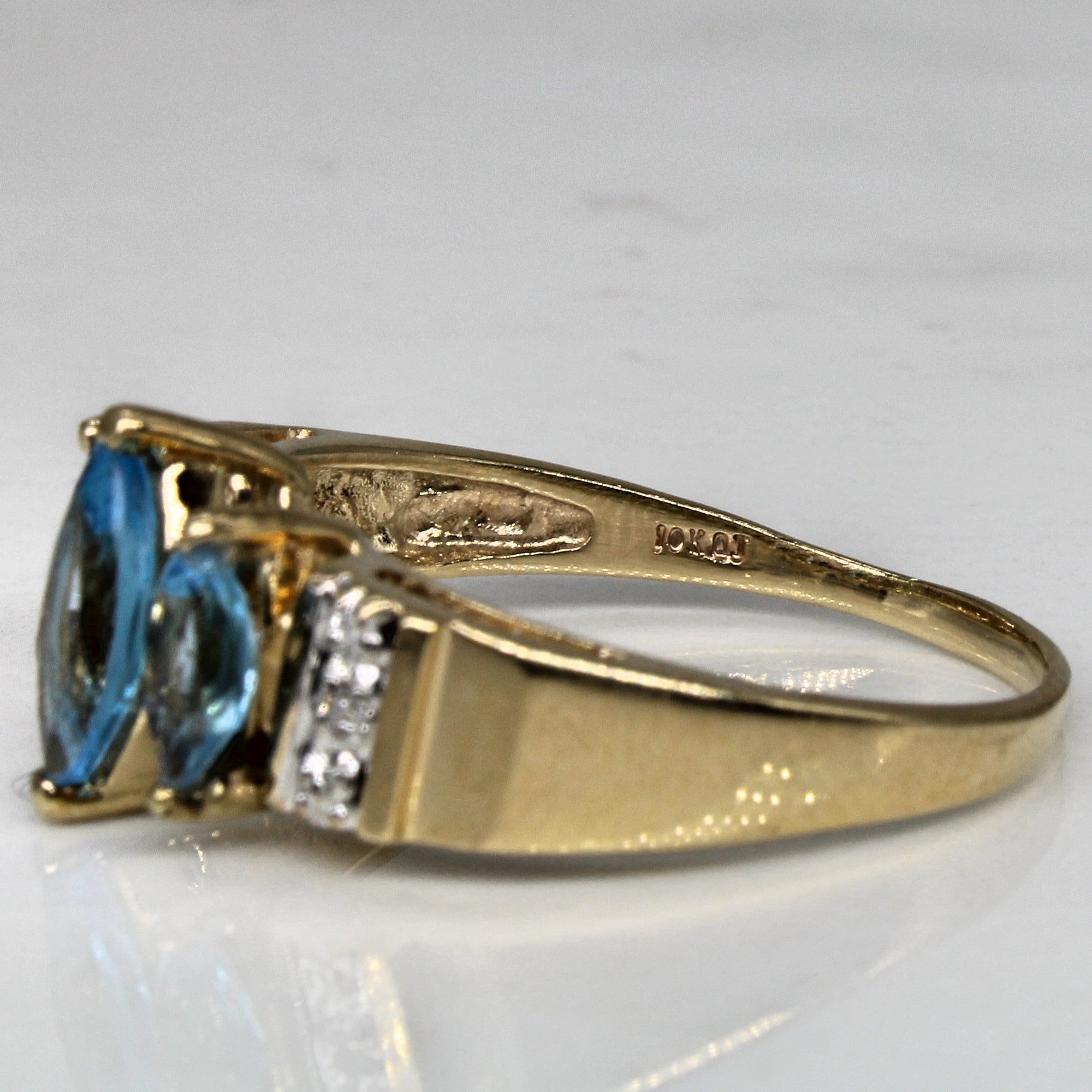 Three Stone Marquise Cut Blue Topaz Ring | 1.00ctw, 0.01ctw | SZ 8.5 |