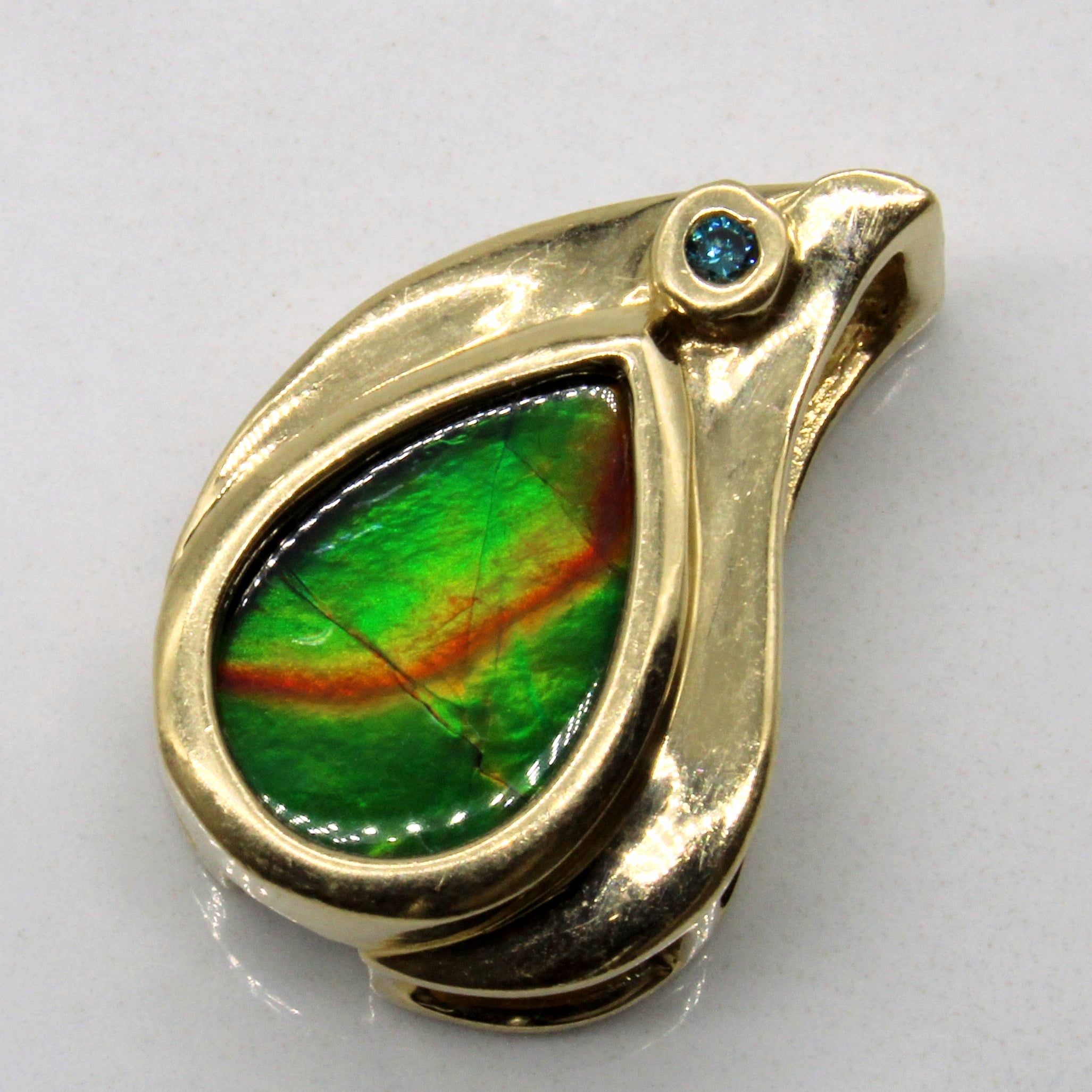 Ammolite & Blue Diamond Pendant | 1.50ct, 0.01ct |