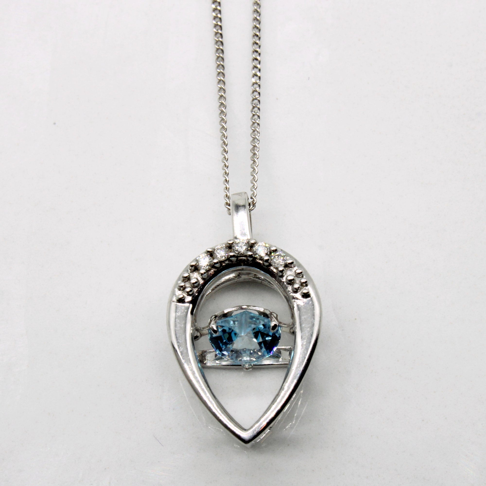 Fluttering Blue Topaz & Diamond Heart Necklace | 0.50ct, 0.04ctw | 19