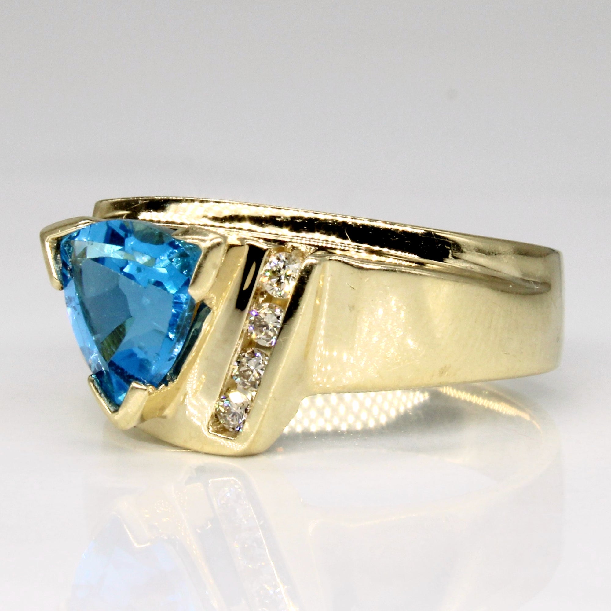 Trillion Cut Blue Topaz & Diamond Ring | 1.46ct, 0.06ctw | SZ 6.75 |