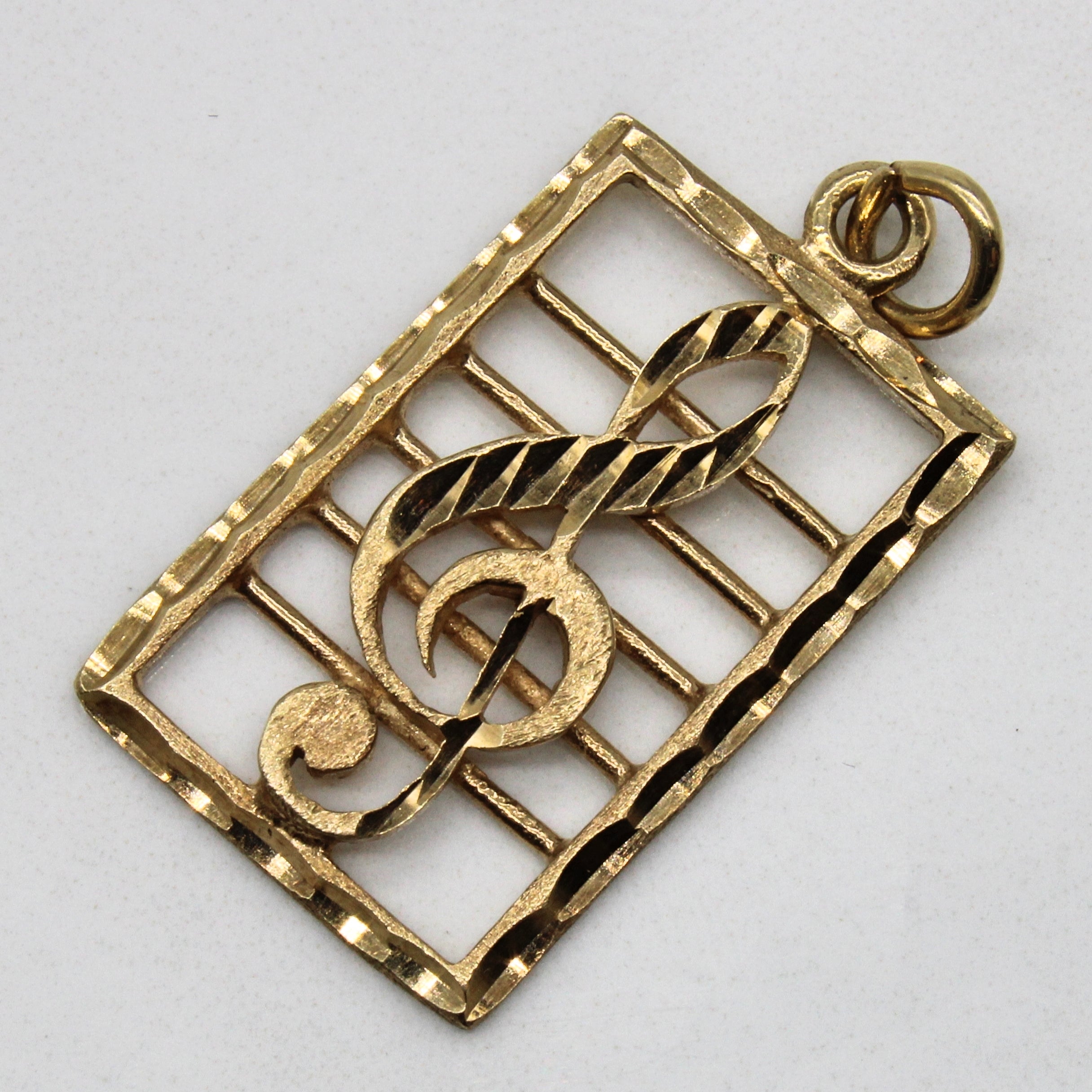 10k Yellow Gold Treble Clef Pendant |