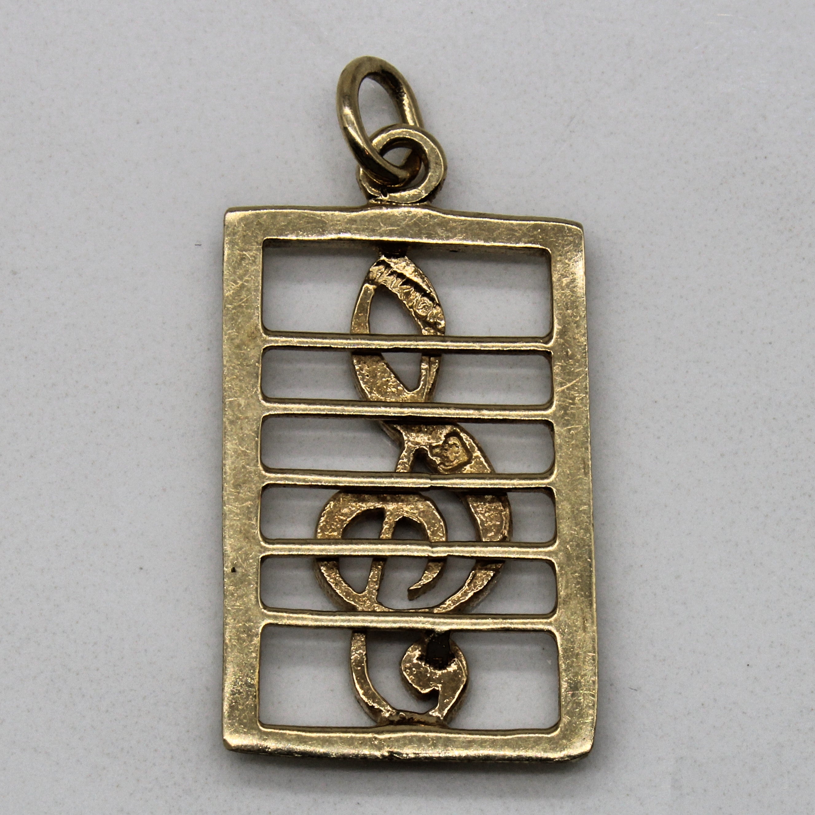 10k Yellow Gold Treble Clef Pendant |