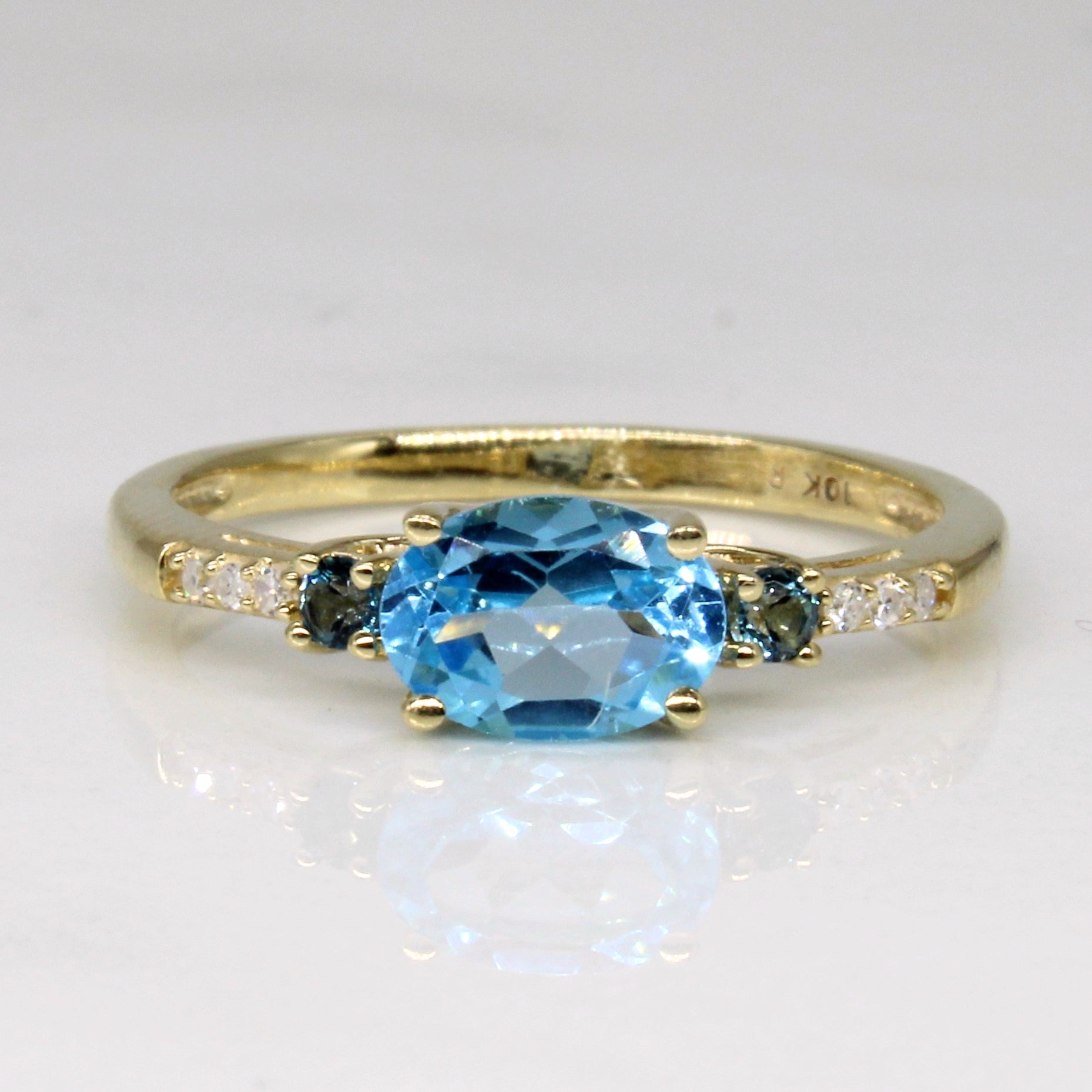 East West Blue Topaz & Diamond Ring | 0.80ctw, 0.03ctw | SZ 6 |
