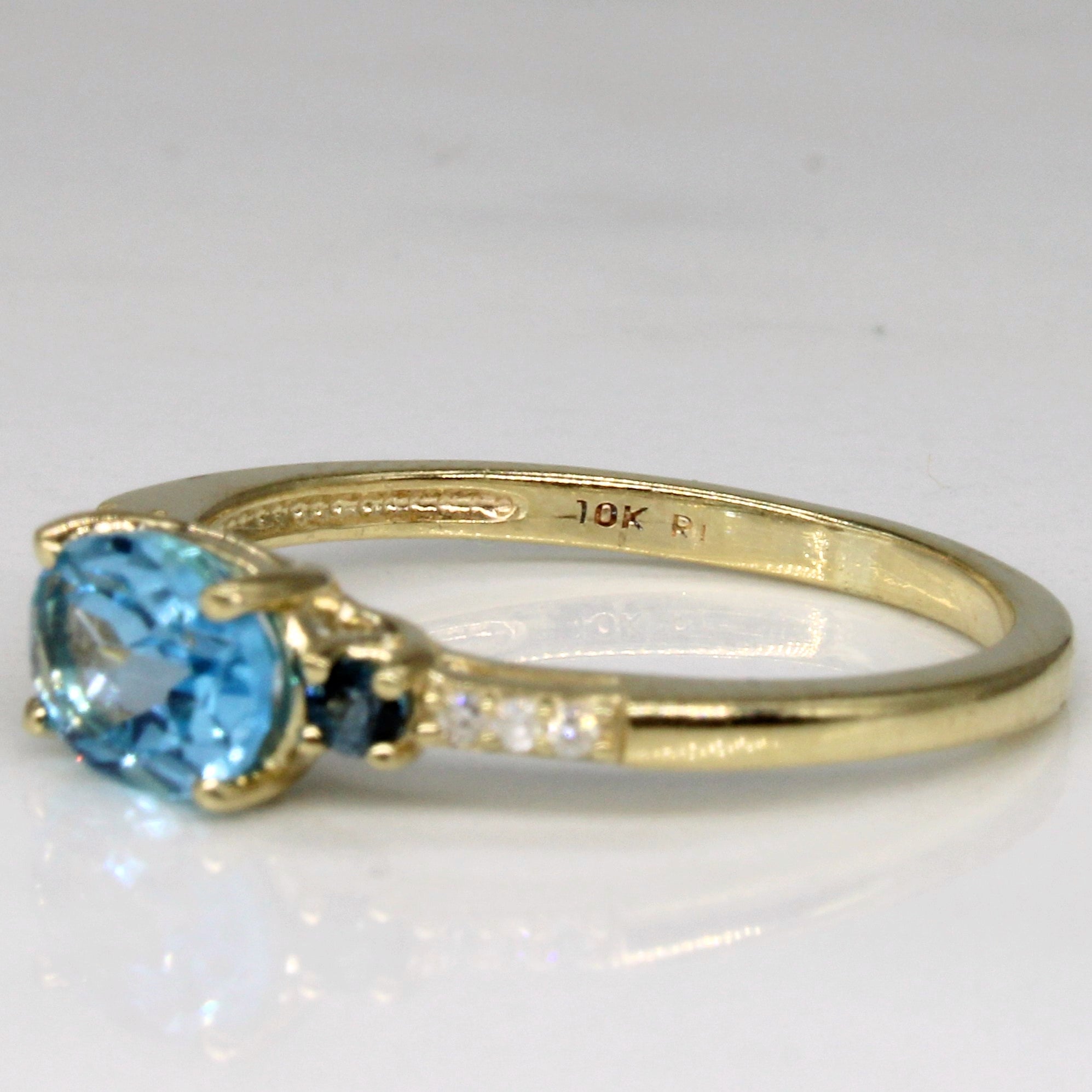 East West Blue Topaz & Diamond Ring | 0.80ctw, 0.03ctw | SZ 6 |