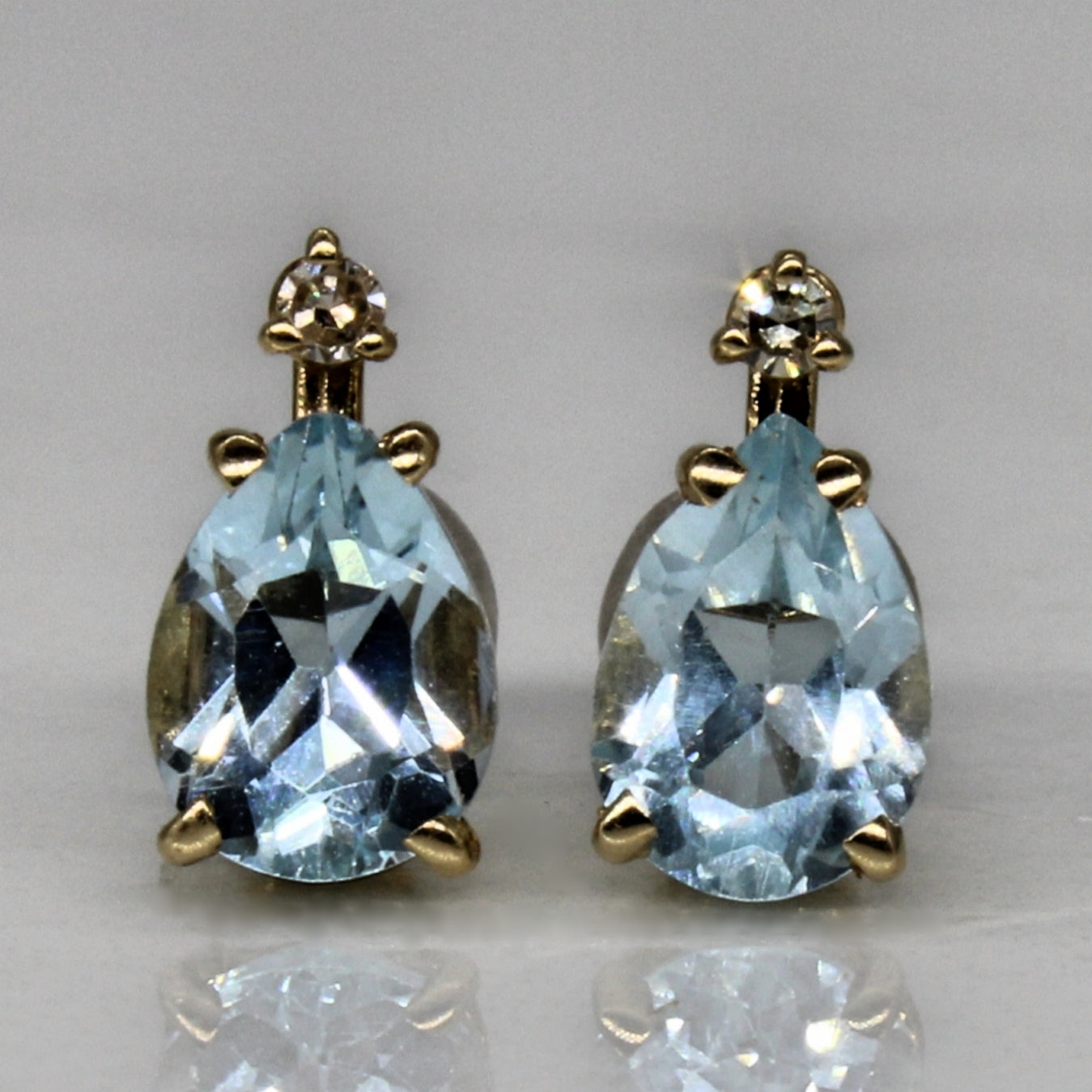 Blue Topaz & Diamond Stud Earrings | 1.50ctw, 0.03ctw |