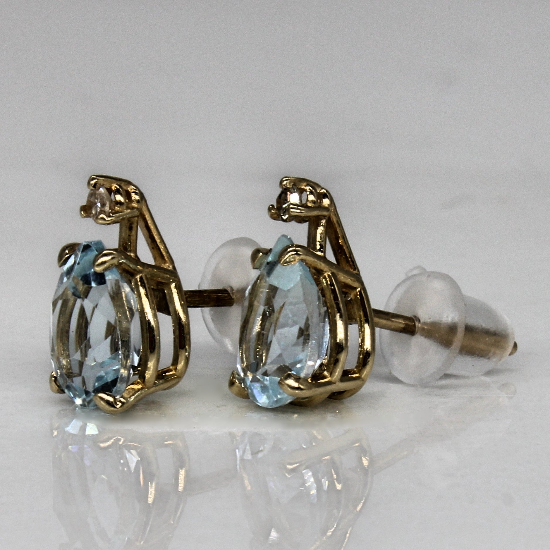 Blue Topaz & Diamond Stud Earrings | 1.50ctw, 0.03ctw |