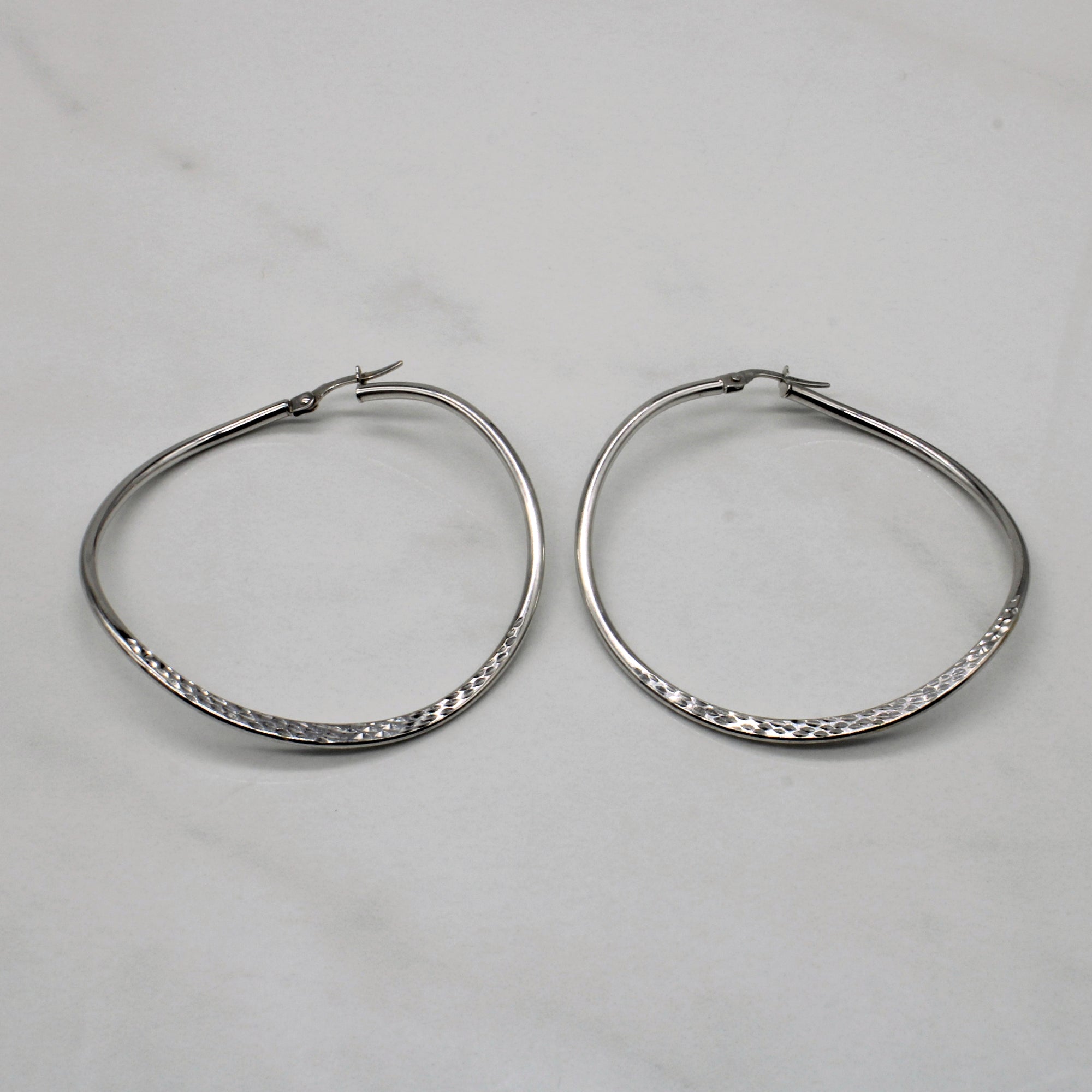 White Gold Textured Wave Hoops |