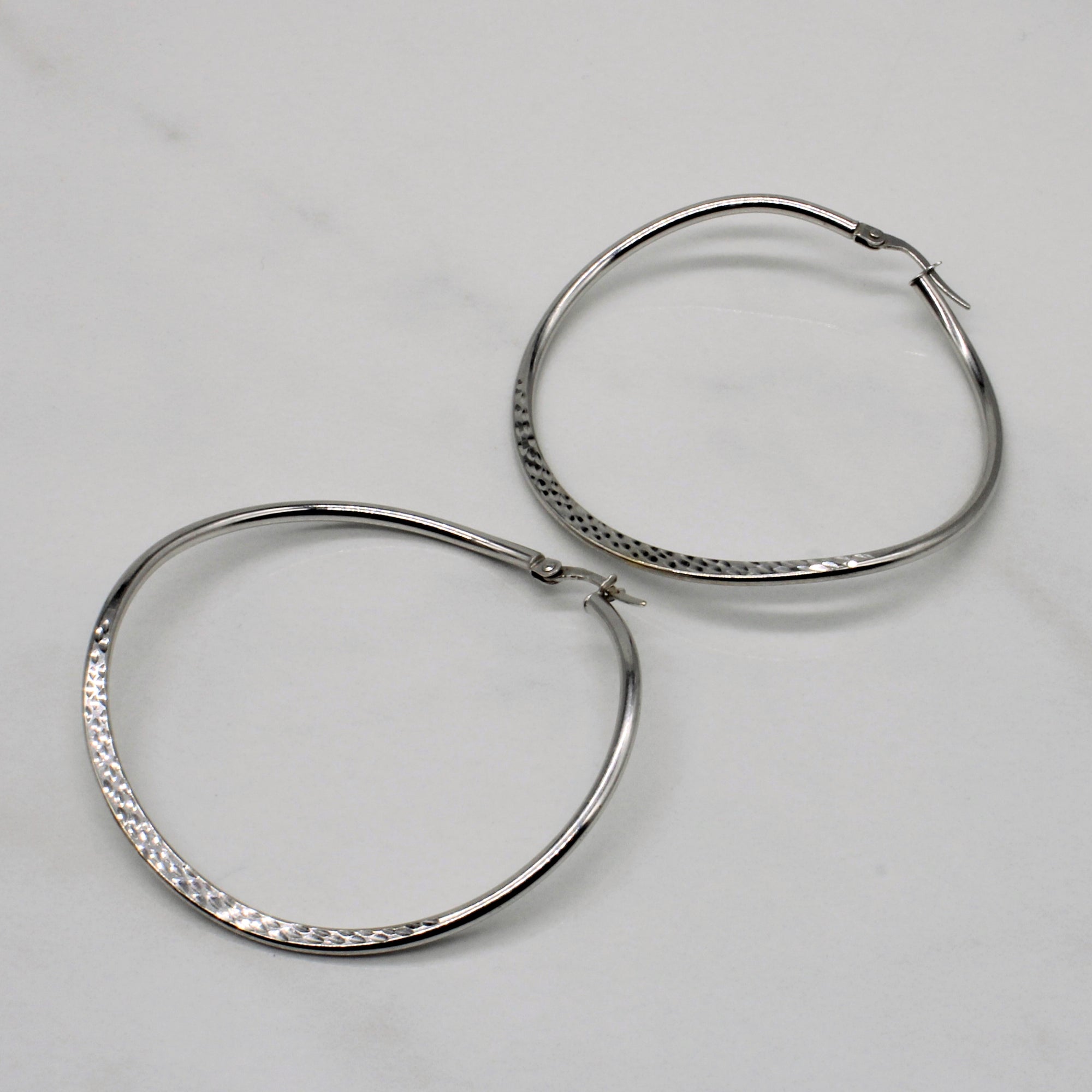 White Gold Textured Wave Hoops |